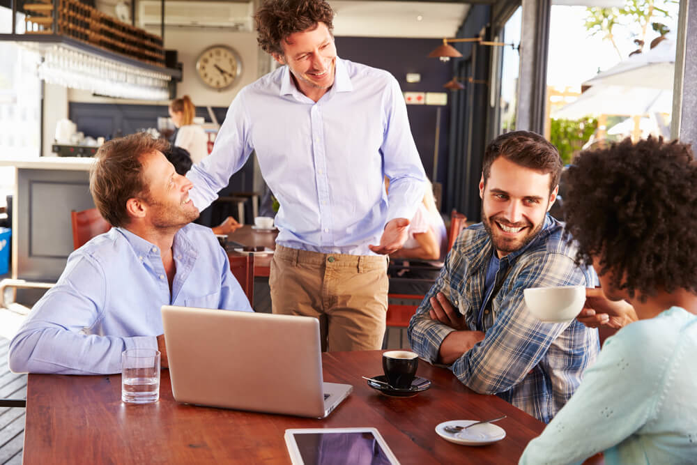 small business owner meeting with clients