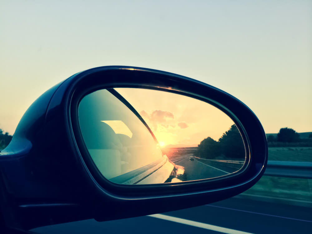 Sunset in rear view mirror
